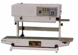 A 2100V with a top heating plate, control panel, and a lower work platform.