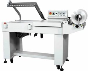 L1611 shrink wrap machine with control panel and film roll on a white background.