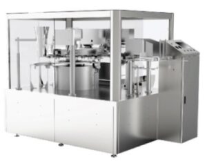 Industrial pharmaceutical filling machine PMB2 with multiple stations and transparent safety enclosures in a clean, organized setup.